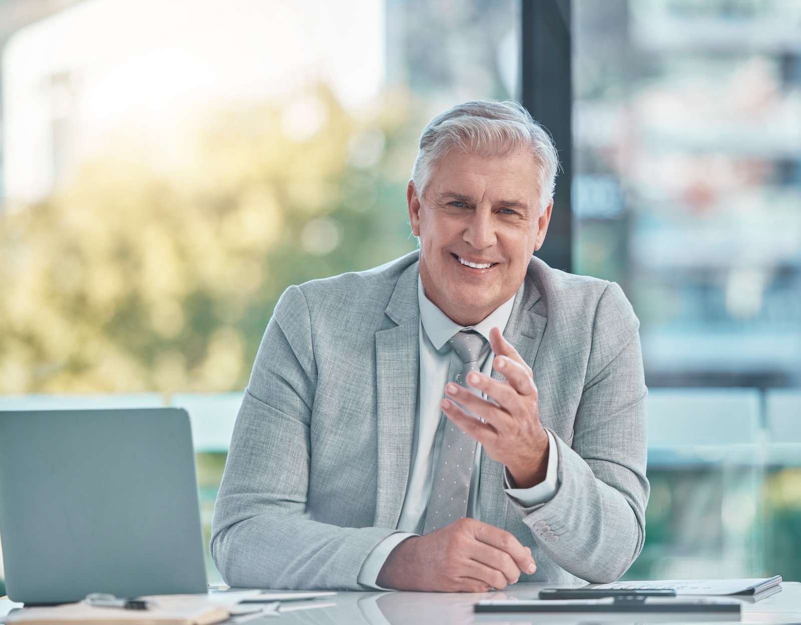 Senior business man, portrait and smile in office at corporate company for testimonial and motivati